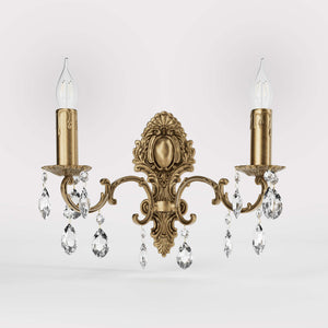 Baroque brass wall lamp with two lights and crystal pendants by Ghidini 1849 - Finish: OBS Bronze Satin Brass