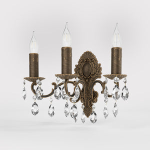 Baroque brass wall lamp with three lights and crystal pendants by Ghidini 1849 - Finish: OBM Bronze Satin Matt Brass