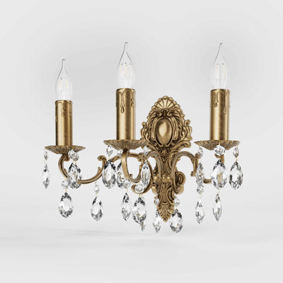 Baroque brass wall lamp with three lights and crystal pendants by Ghidini 1849 - Finish: OBS Bronze Satin Brass