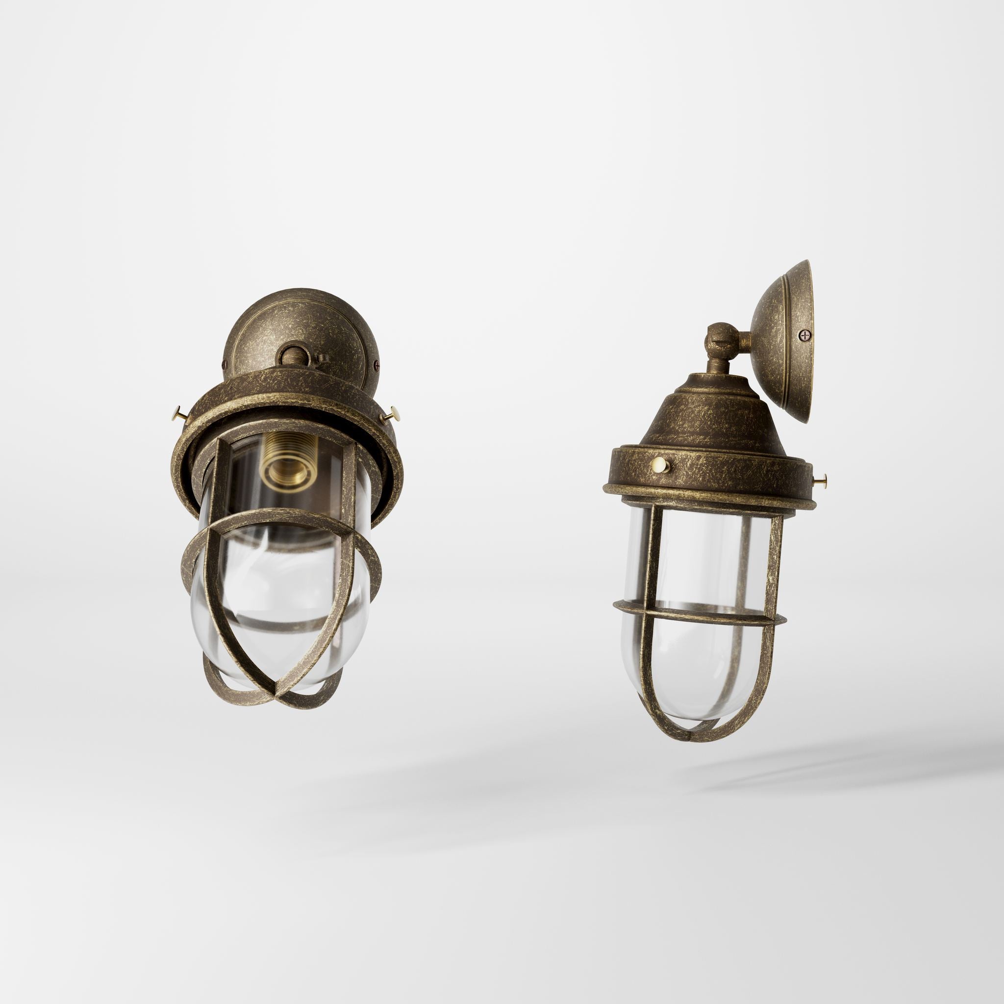 Rustic outdoor wall light in brass with clear glass shade, industrial maritime design, and adjustable joint by Ghidini 1849 - Finish: OAS Antique Brass