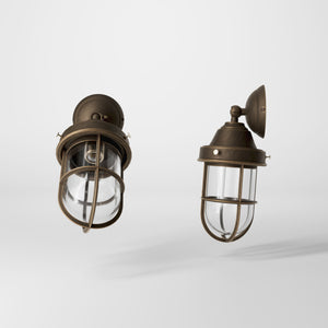 Rustic outdoor wall light in brass with clear glass shade, industrial maritime design, and adjustable joint by Ghidini 1849 - Finish: OBM Bronze Satin Matt Brass
