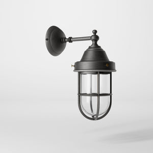 Outdoor wall lamp in brass with a transparent glass cage, industrial style, weather-resistant by Ghidini 1849 - Finish: OBR Dark Bronze