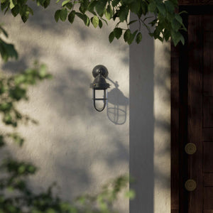 Outdoor wall lamp in brass with a transparent glass cage, industrial style, weather-resistant by Ghidini 1849 - Finish: OBR Dark Bronze
