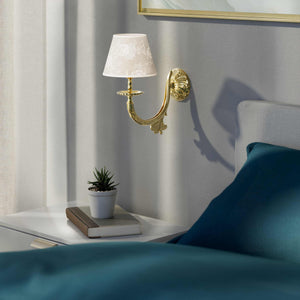 Classical brass wall lamp with decorated white fabric shade, curved arm and ornamental rosette, traditional floral details - Finish: OLV Polished Brass