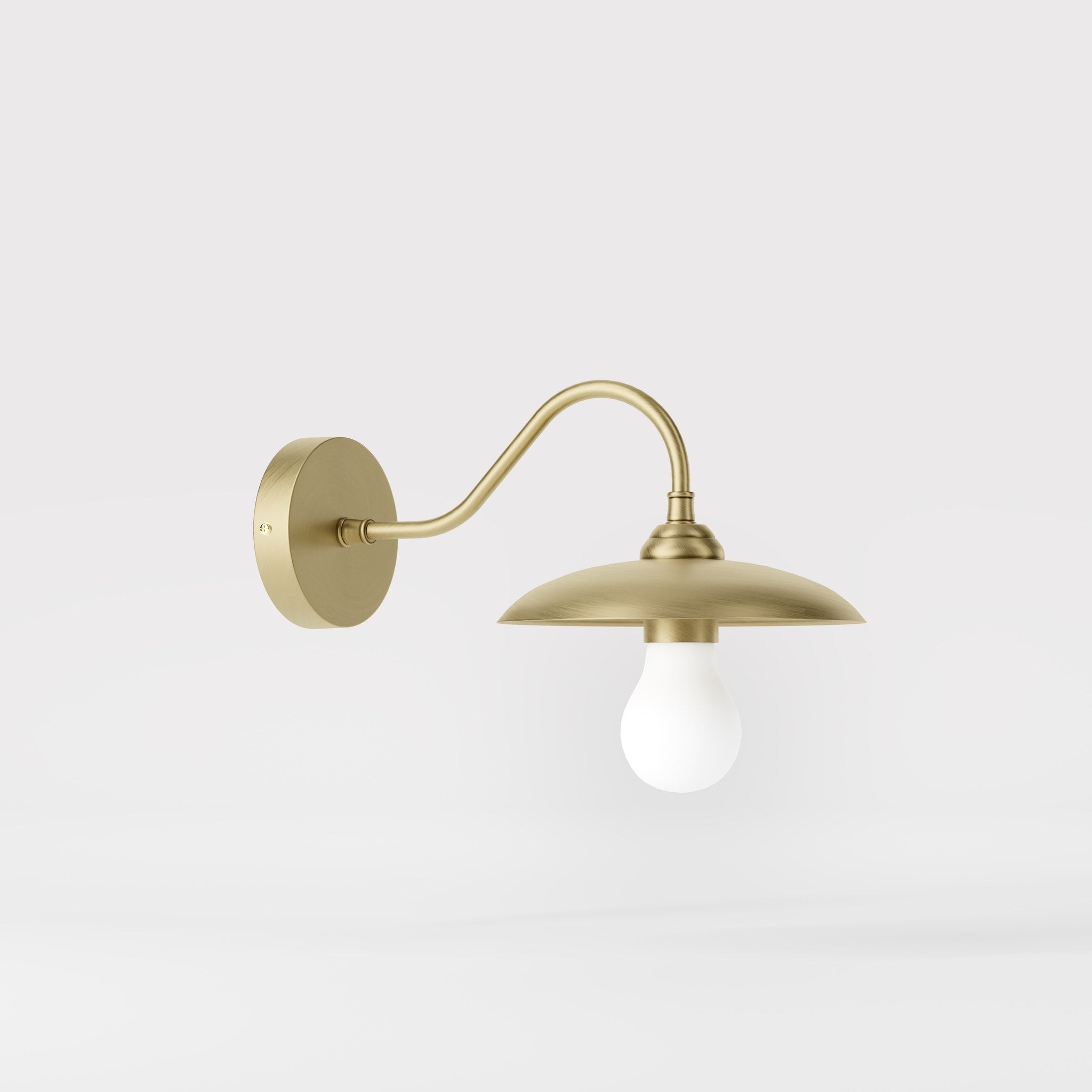 Vintage brass wall lamp with curved arm, ideal for sophisticated interiors by Ghidini 1849 - Finish: OBV Bronze Satin Light Brass