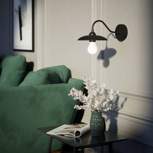 Vintage brass wall lamp with curved arm, ideal for sophisticated interiors by Ghidini 1849 - Finish: ONO Matt Black