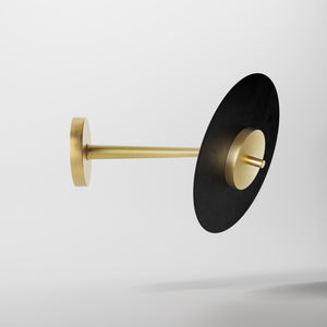 Wall lamp in brass and iron with an adjustable black vinyl-style disc, minimalist design for modern interiors by Ghidini 1849 - Finish: OBV Bronze Satin Light Brass