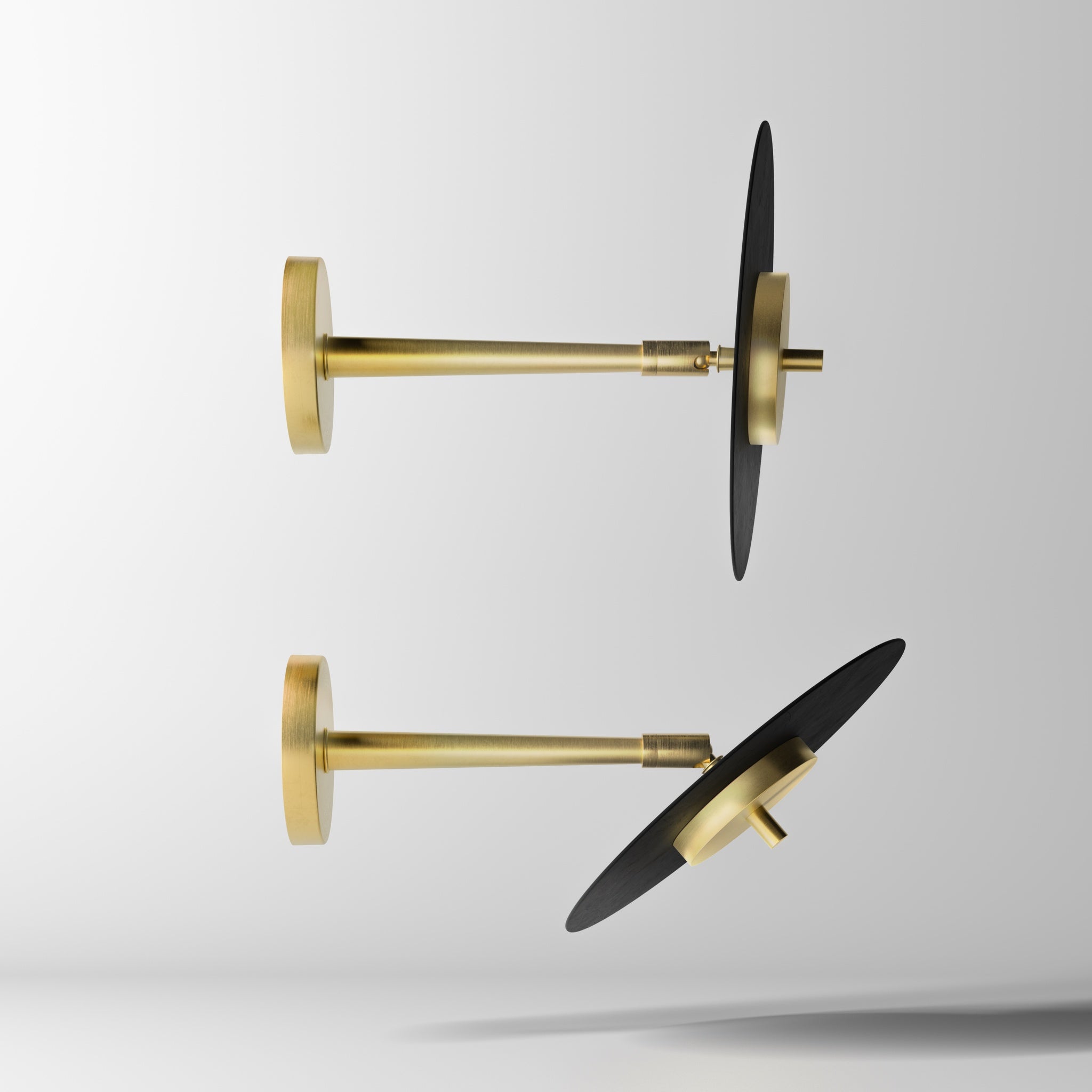 Wall lamp in brass and iron with an adjustable black vinyl-style disc, minimalist design for modern interiors by Ghidini 1849 - Finish: OBV Bronze Satin Light Brass