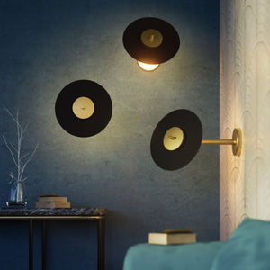 Wall lamp in brass and iron with an adjustable black vinyl-style disc, minimalist design for modern interiors by Ghidini 1849 - Finish: OBV Bronze Satin Light Brass