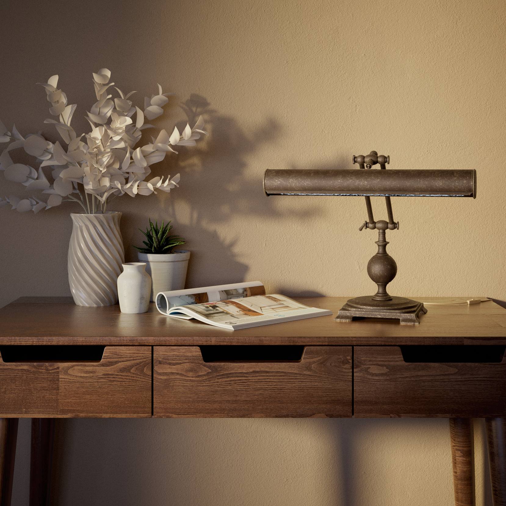 Executive brass desk lamp with cylindrical shade and dual articulation points mounted on decorative square base with spherical accent by Ghidini 1849 - Finish: OAS Antique Brass