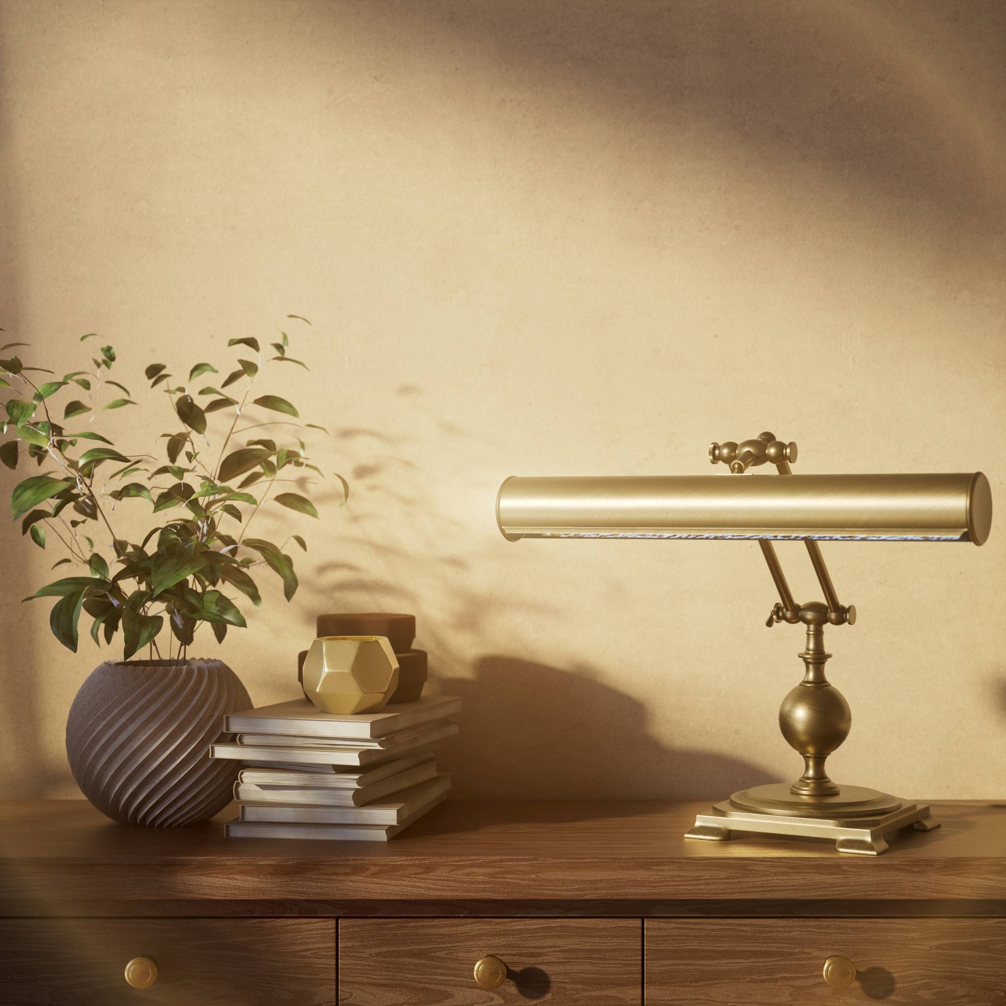 Executive brass desk lamp with cylindrical shade and dual articulation points mounted on decorative square base with spherical accent by Ghidini 1849 - Finish: OBS Bronze Satin Brass