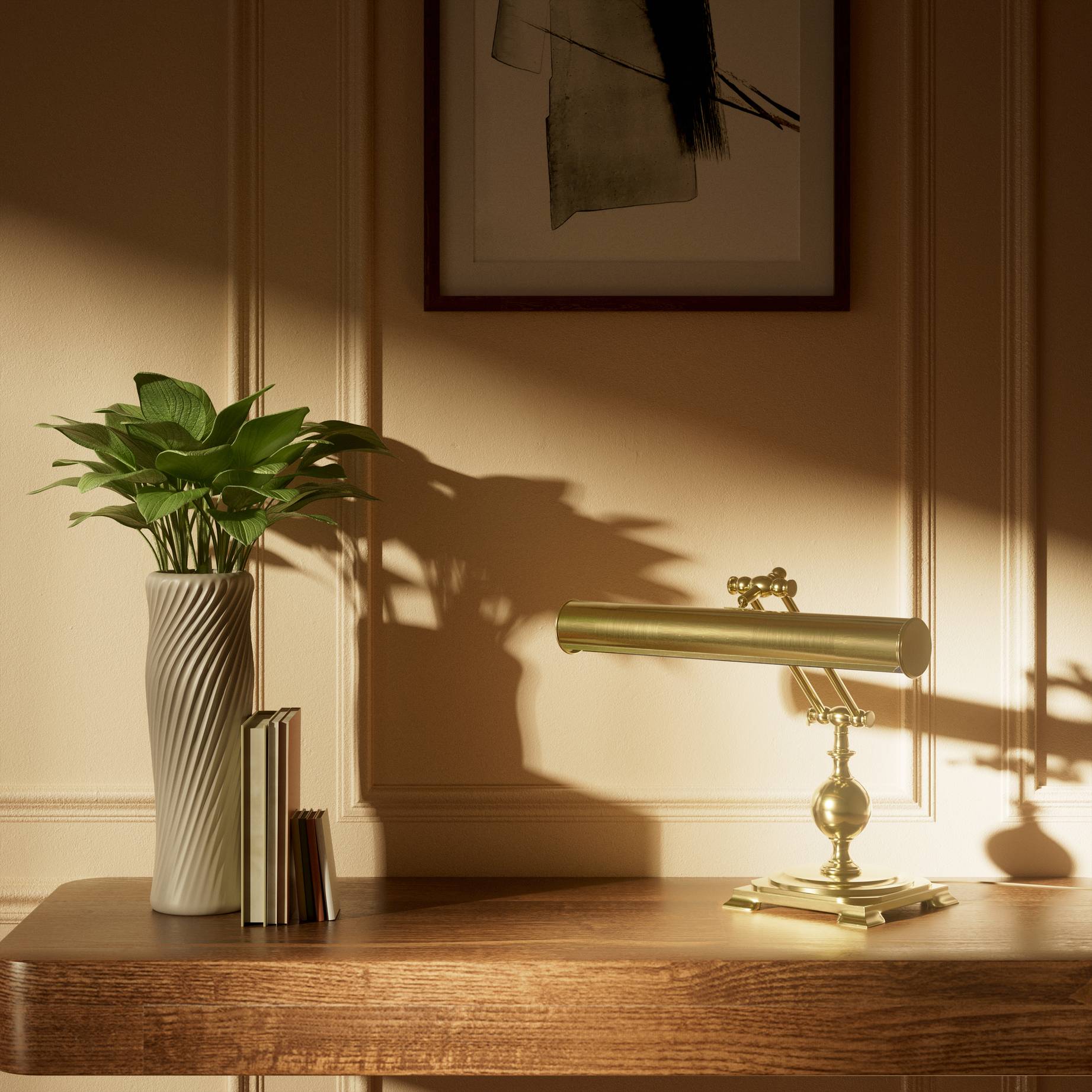 Executive brass desk lamp with cylindrical shade and dual articulation points mounted on decorative square base with spherical accent by Ghidini 1849 - Finish: OLV Polished Brass