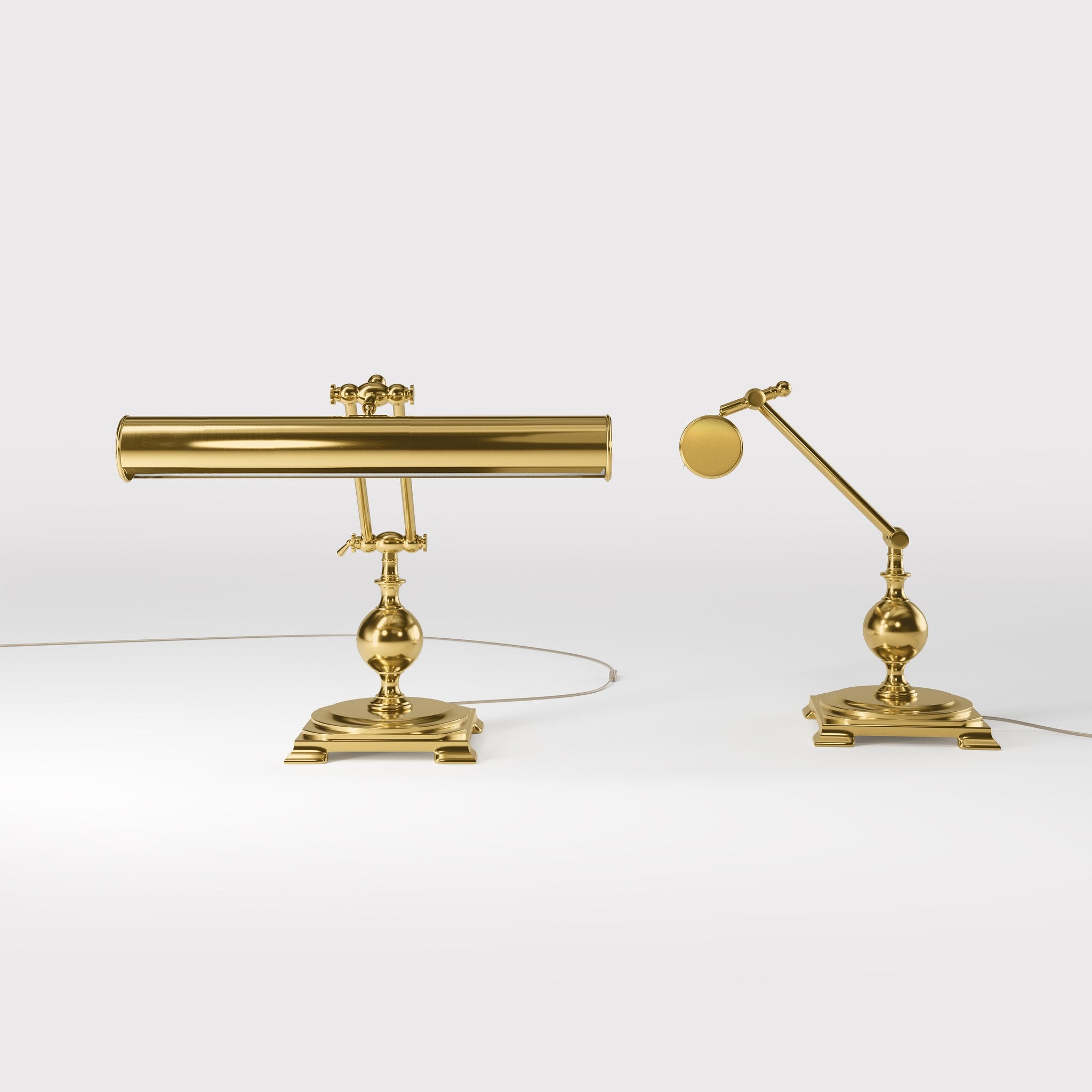 Executive brass desk lamp with cylindrical shade and dual articulation points mounted on decorative square base with spherical accent by Ghidini 1849 - Finish: ORO 24K Gold Plated