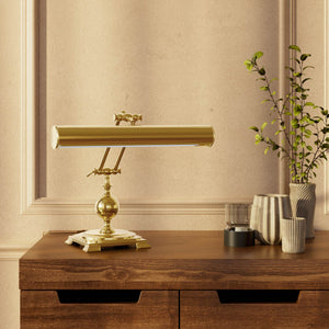 Executive brass desk lamp with cylindrical shade and dual articulation points mounted on decorative square base with spherical accent by Ghidini 1849 - Finish: ORO 24K Gold Plated