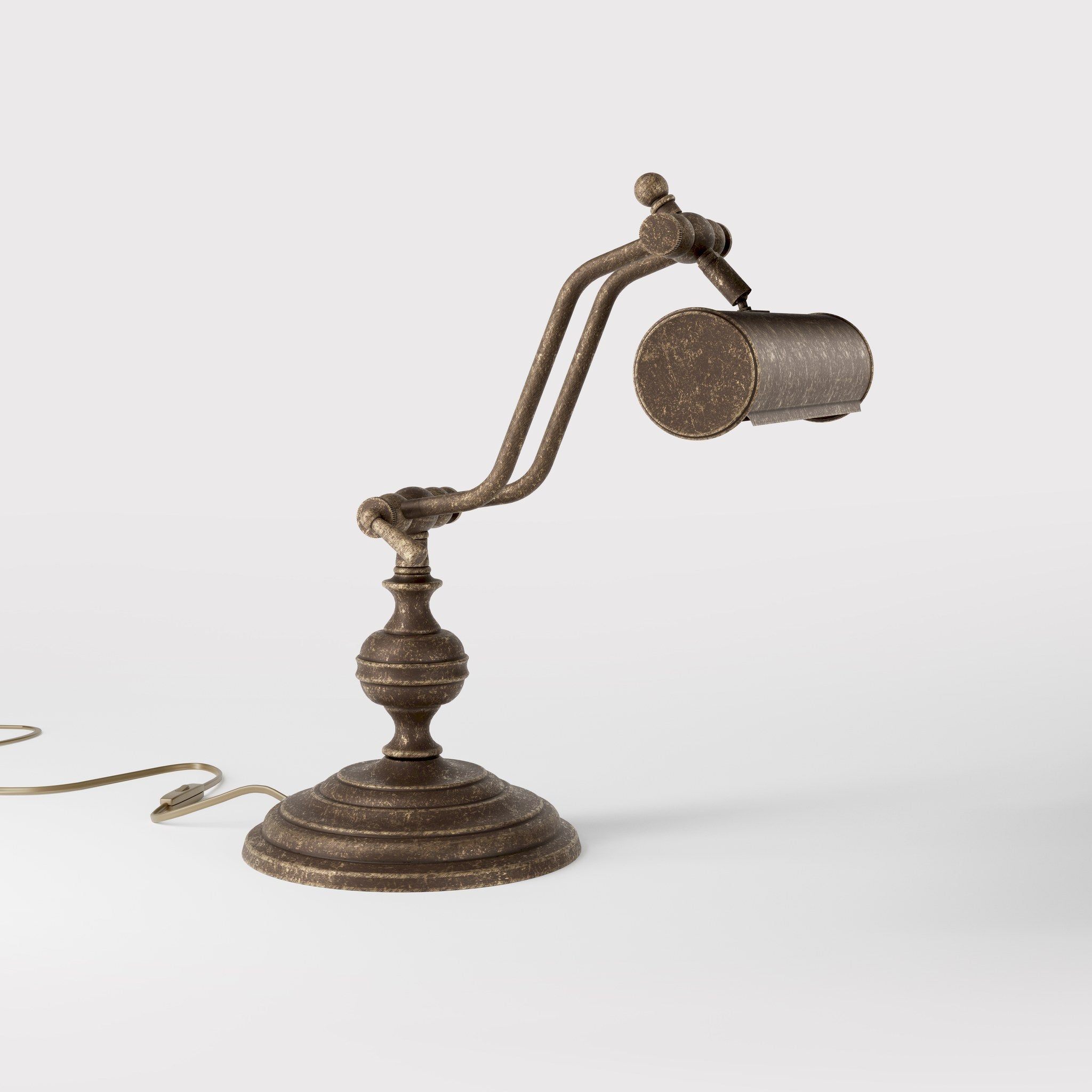 Brass study lamp with adjustable cylindrical shade on turned base with concentric moldings and dual joint system by Ghidini 1849 - Finish: OAS Antique Brass