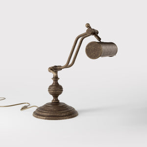 Brass study lamp with adjustable cylindrical shade on turned base with concentric moldings and dual joint system by Ghidini 1849 - Finish: OAS Antique Brass