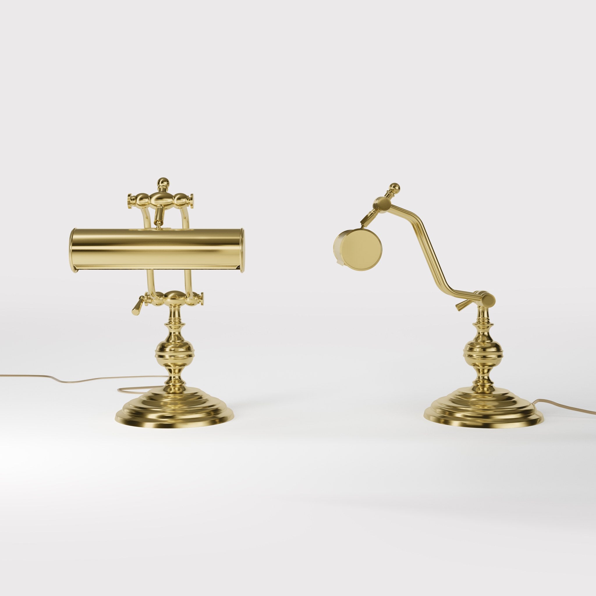 Brass study lamp with adjustable cylindrical shade on turned base with concentric moldings and dual joint system by Ghidini 1849 - Finish: OLV Polished Brass