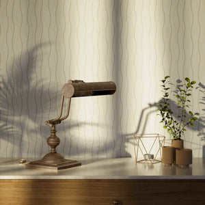 Vintage brass table lamp with adjustable cylindrical shade and articulated arm on square base with turned element by Ghidini 1849 - Finish: OAS Antique Brass