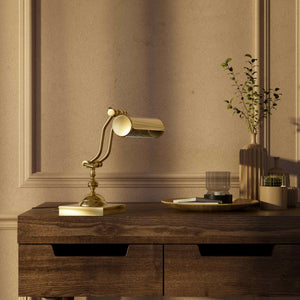 Articulated brass table lamp with adjustable arms and cylindrical shade industrial style for desk lighting by Ghidini 1849 - Finish: OLV Polished Brass