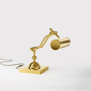 Articulated brass table lamp with adjustable arms and cylindrical shade industrial style for desk lighting by Ghidini 1849 - Finish: ORO 24K Gold Plated