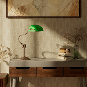 Classic brass banker desk lamp with green glass shade articulated arm and stepped base with fluted column by Ghidini 1849 - Finish: OAS Antique Brass