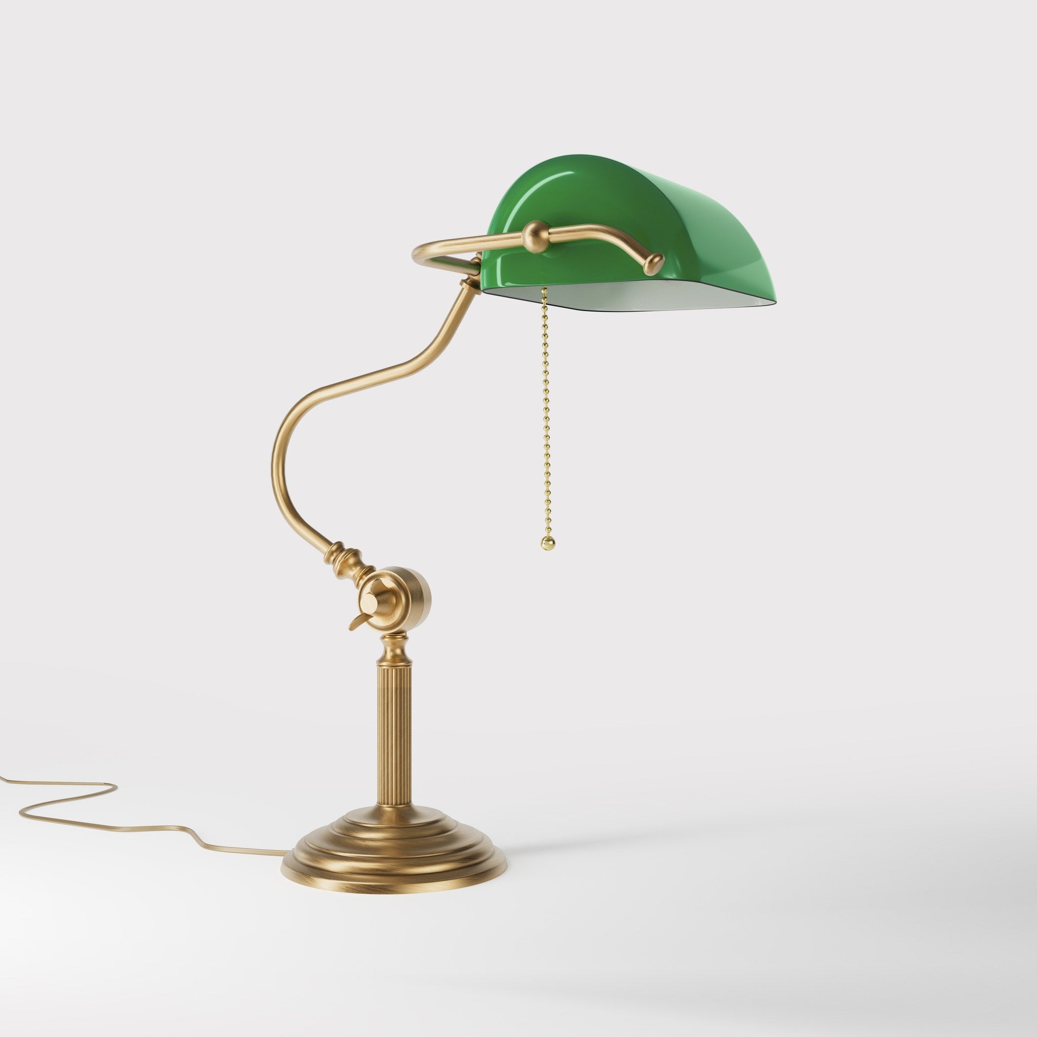 Classic brass banker desk lamp with green glass shade articulated arm and stepped base with fluted column by Ghidini 1849 - Finish: OBS Bronze Satin Brass