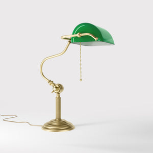 Classic brass banker desk lamp with green glass shade articulated arm and stepped base with fluted column by Ghidini 1849 - Finish: OBV Bronze Satin Light Brass