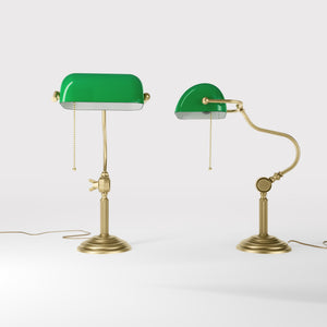 Classic brass banker desk lamp with green glass shade articulated arm and stepped base with fluted column by Ghidini 1849 - Finish: OBV Bronze Satin Light Brass