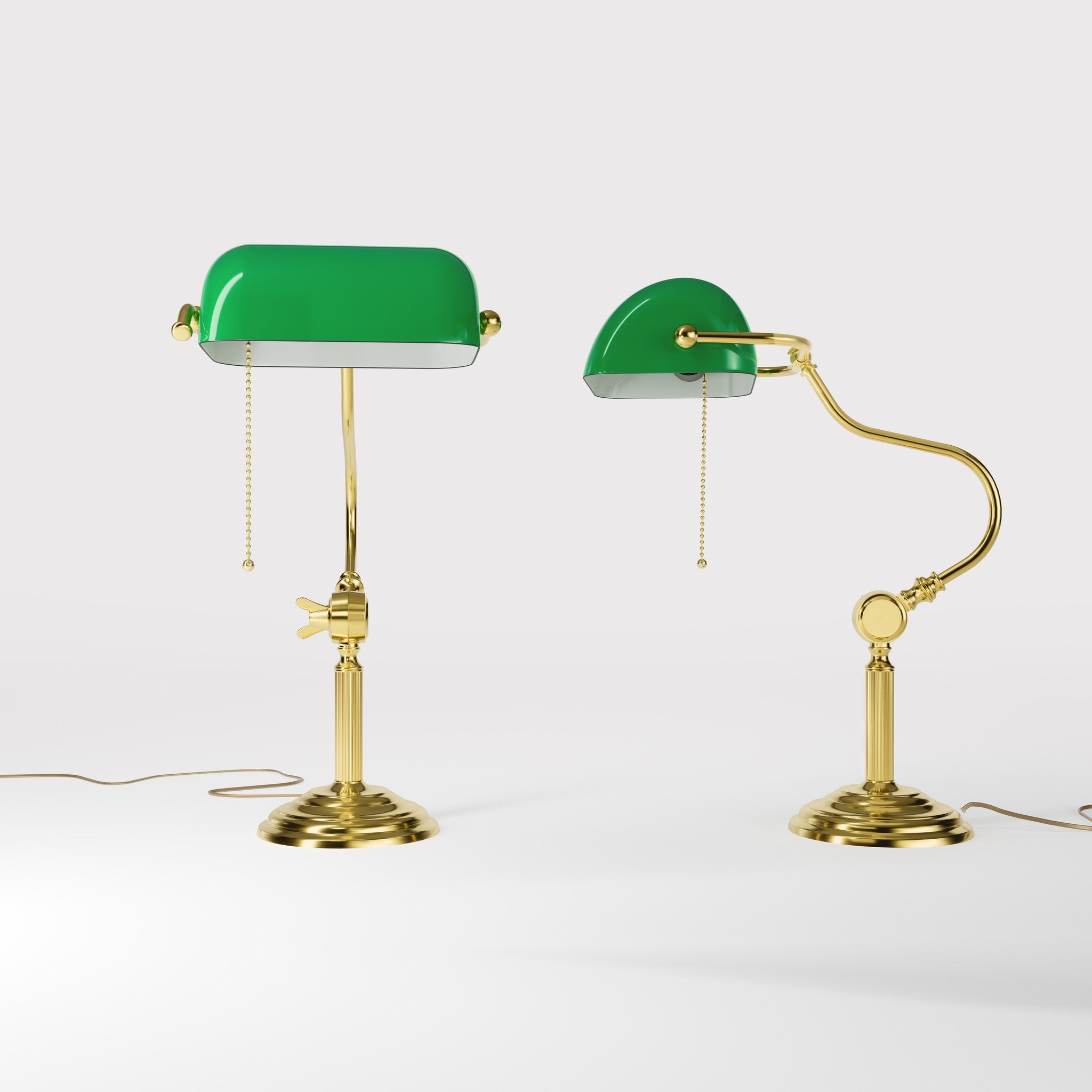 Classic brass banker desk lamp with green glass shade articulated arm and stepped base with fluted column by Ghidini 1849 - Finish: OLV Polished Brass