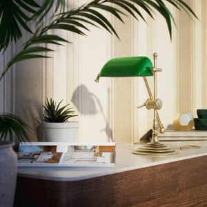 Mini brass desk lamp with green glass shade sliding arm on stem and turned circular base by Ghidini 1849 - Finish: OBV Bronze Satin Light Brass