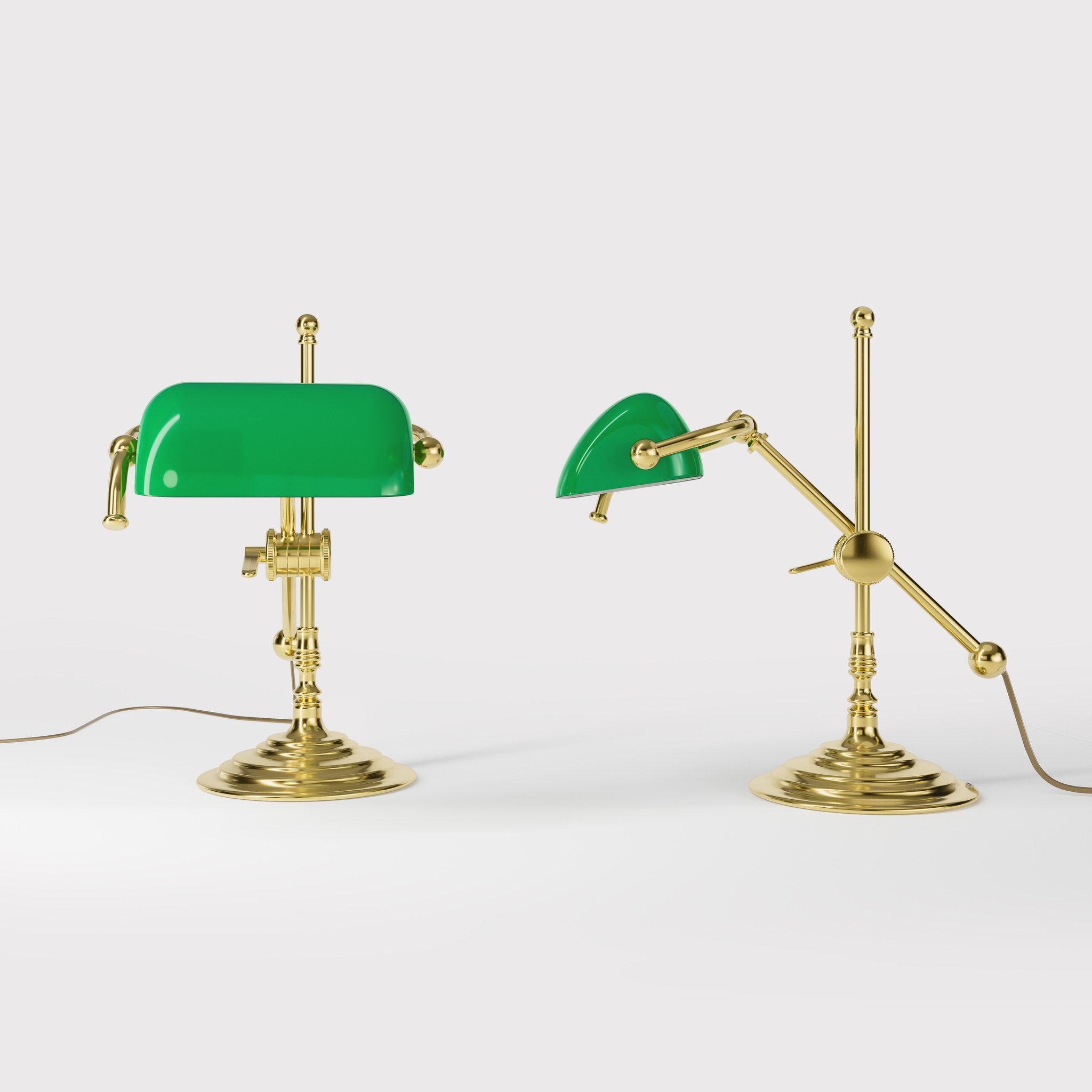 Mini brass desk lamp with green glass shade sliding arm on stem and turned circular base by Ghidini 1849 - Finish: OLV Polished Brass