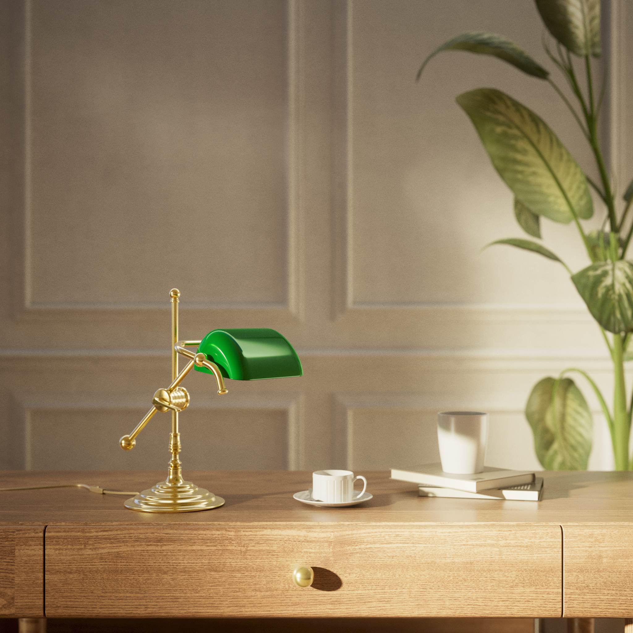Mini brass desk lamp with green glass shade sliding arm on stem and turned circular base by Ghidini 1849 - Finish: OLV Polished Brass
