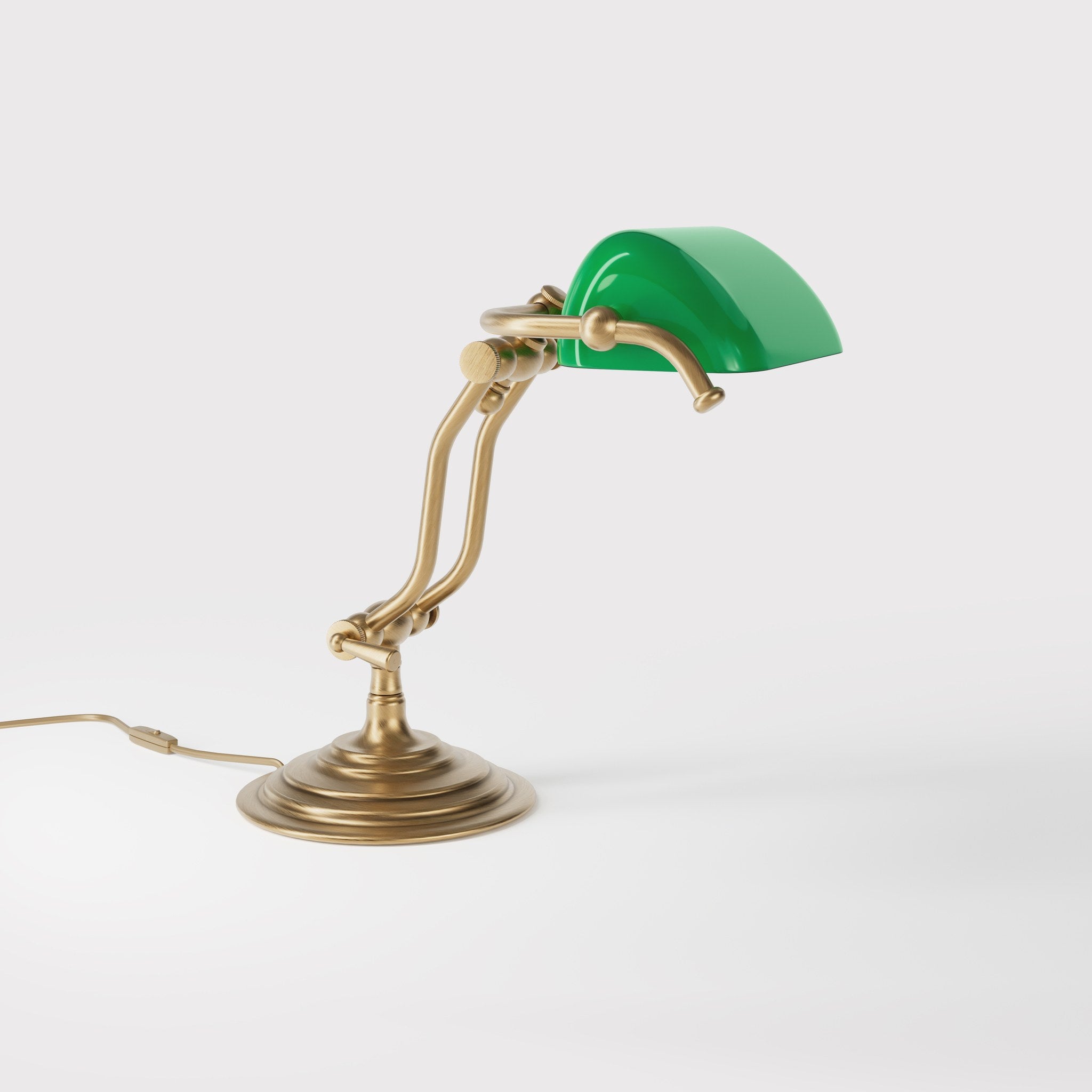 Compact brass desk lamp with green glass shade double joint system and stepped circular base by Ghidini 1849 - Finish: OBS Bronze Satin Brass