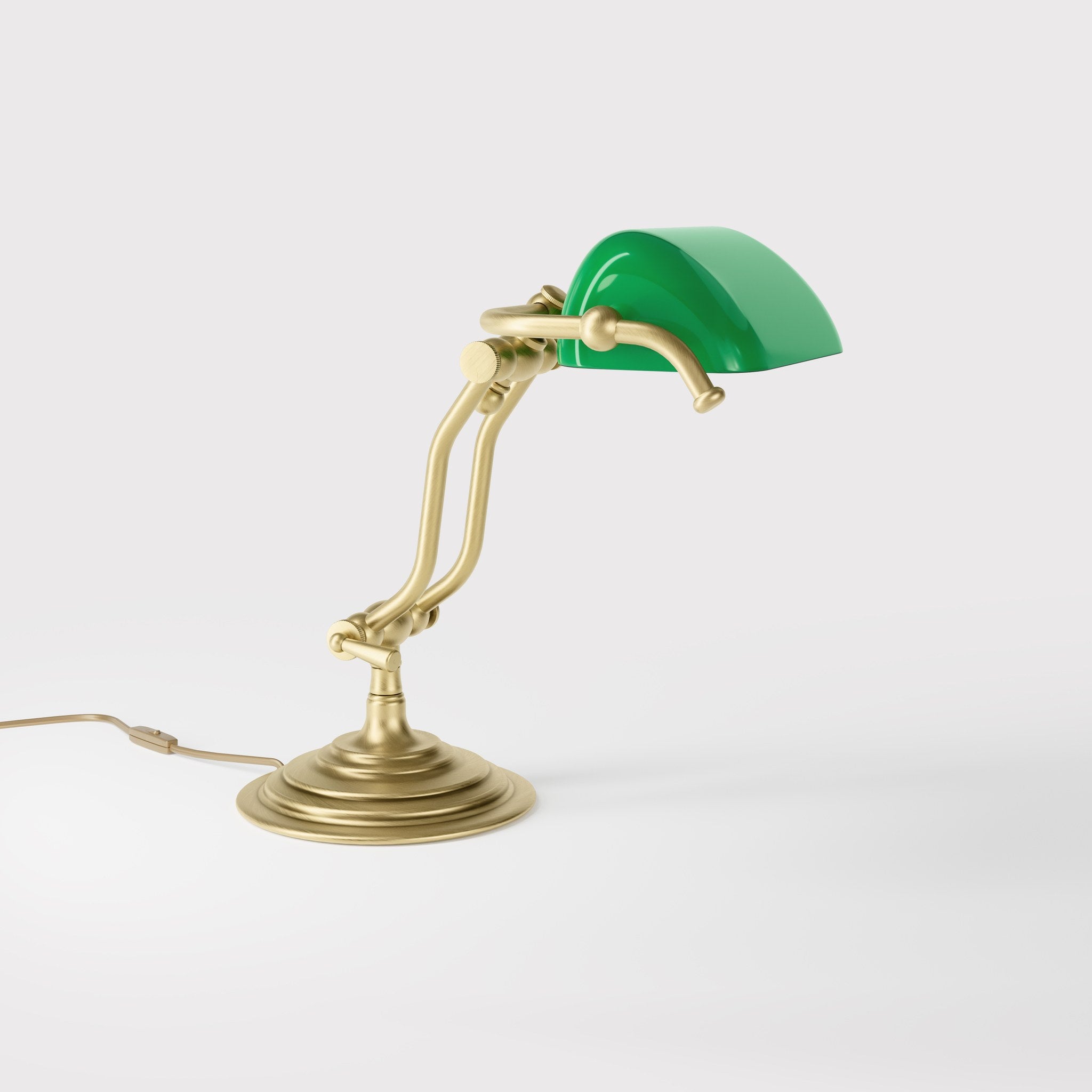 Compact brass desk lamp with green glass shade double joint system and stepped circular base by Ghidini 1849 - Finish: OBV Bronze Satin Light Brass
