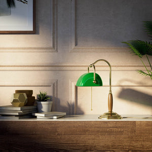 Brass and wood desk lamp with green glass shade chain pull switch and stepped concentric base by Ghidini 1849 - Finish: OLV Polished Brass