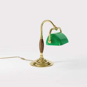 Petite brass and wood desk lamp with compact green shade and stepped concentric base in reduced format by Ghidini 1849 - Finish: OLV Polished Brass