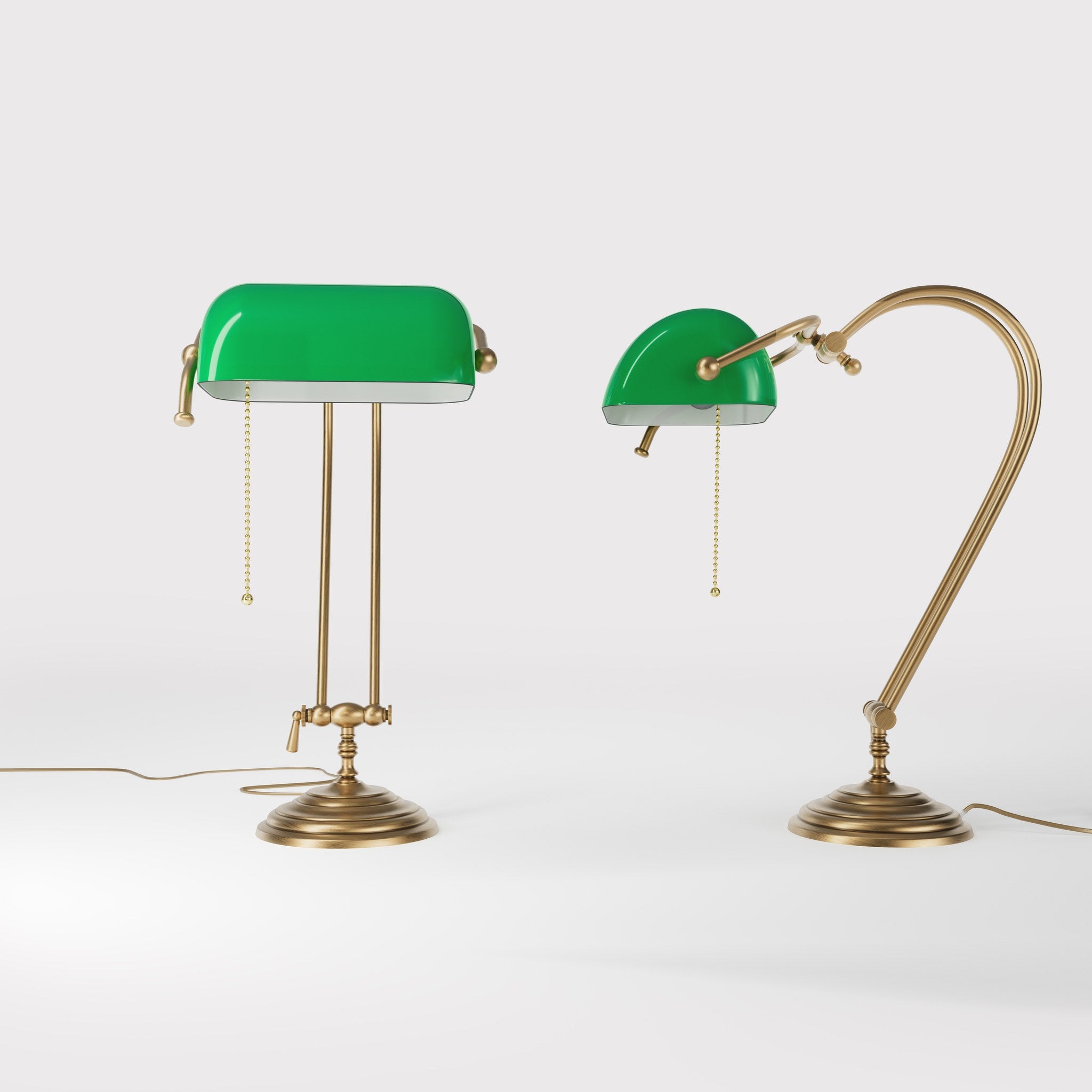 Classic banker's desk lamp with green glass shade and adjustable brass structure featuring dual joints and pull chain switch by Ghidini 1849 - Finish: OBS Bronze Satin Brass