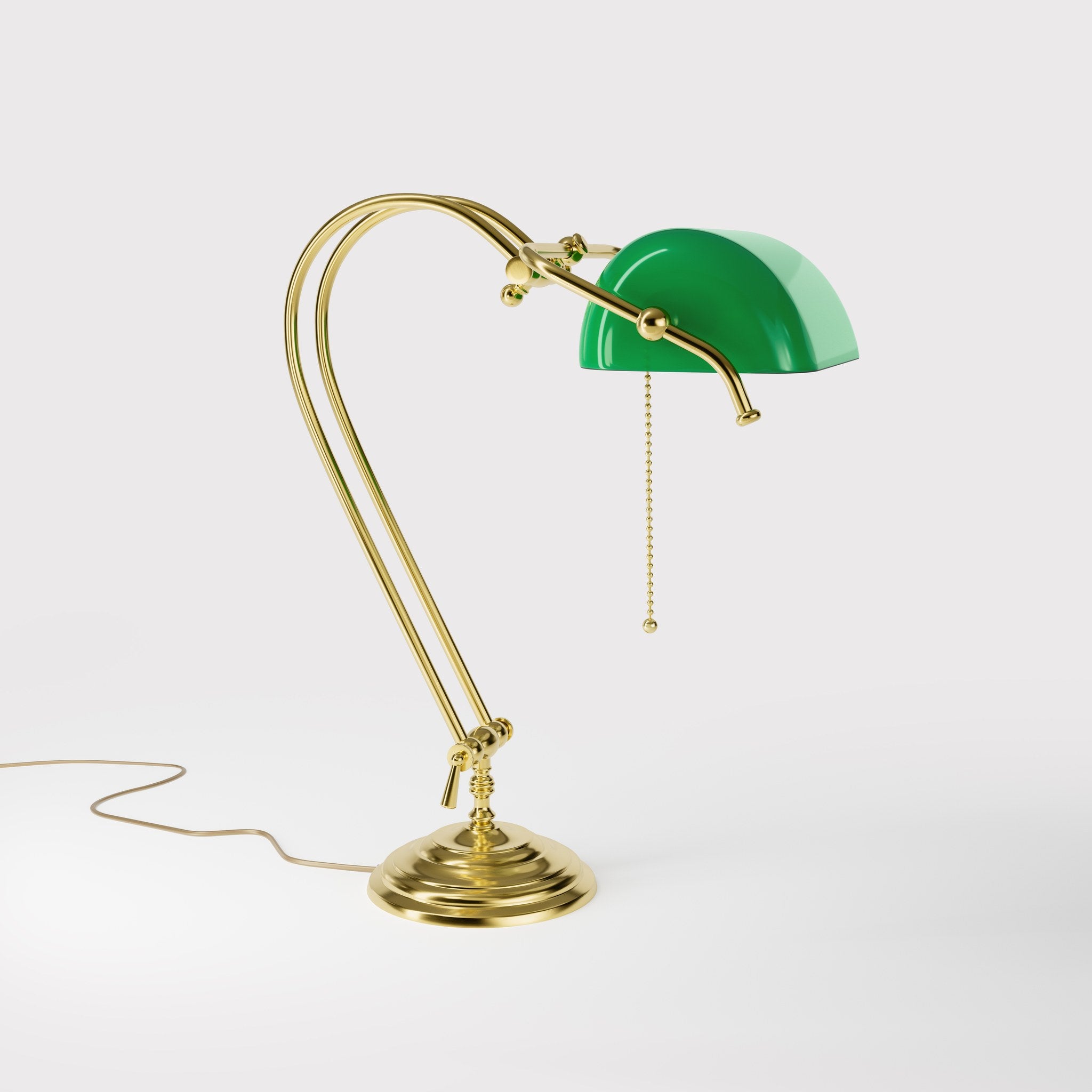 Classic banker's desk lamp with green glass shade and adjustable brass structure featuring dual joints and pull chain switch by Ghidini 1849 - Finish: OLV Polished Brass