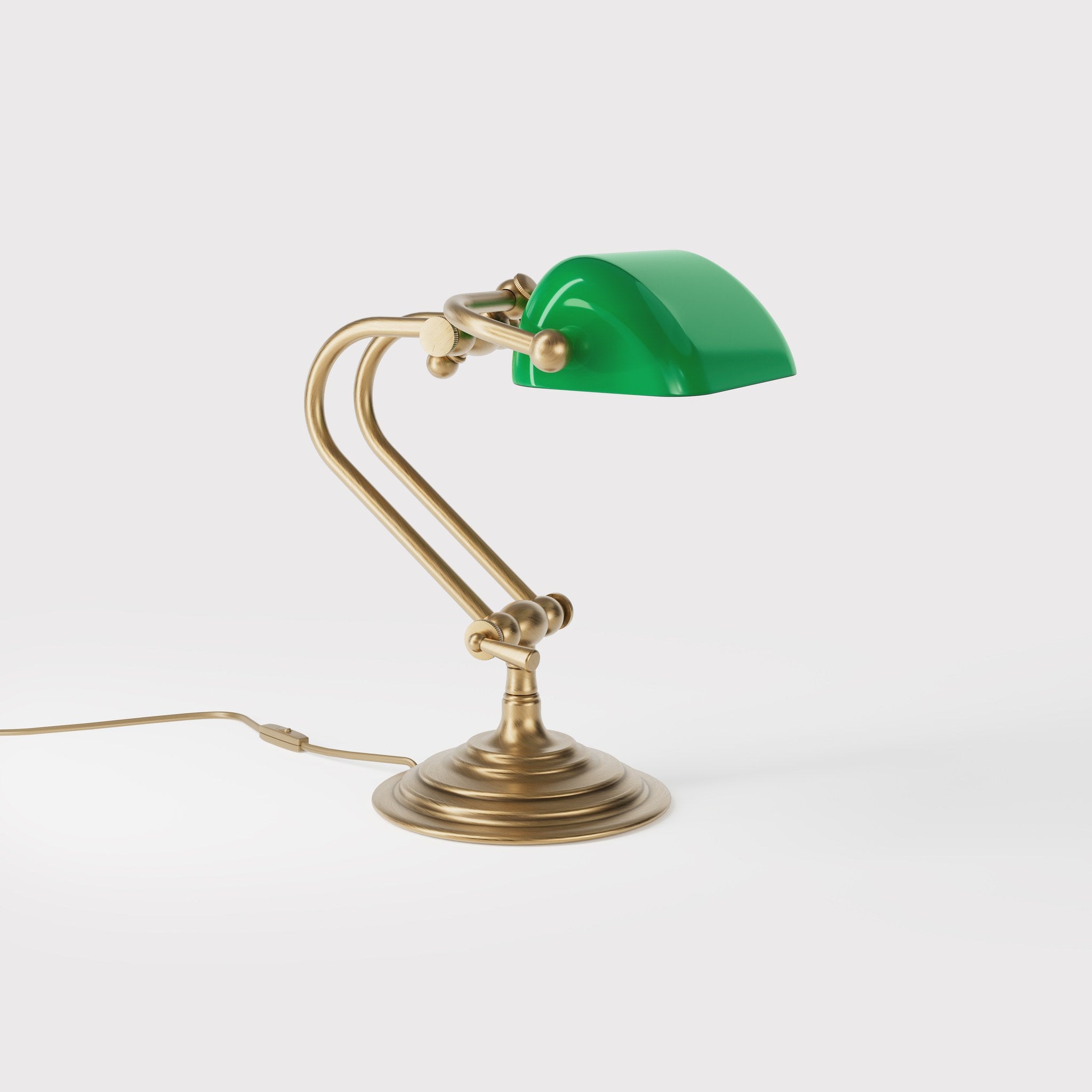 Mini banker's lamp with green glass shade and compact adjustable brass structure with dual joints and pull chain by Ghidini 1849 - Finish: OBS Bronze Satin Brass