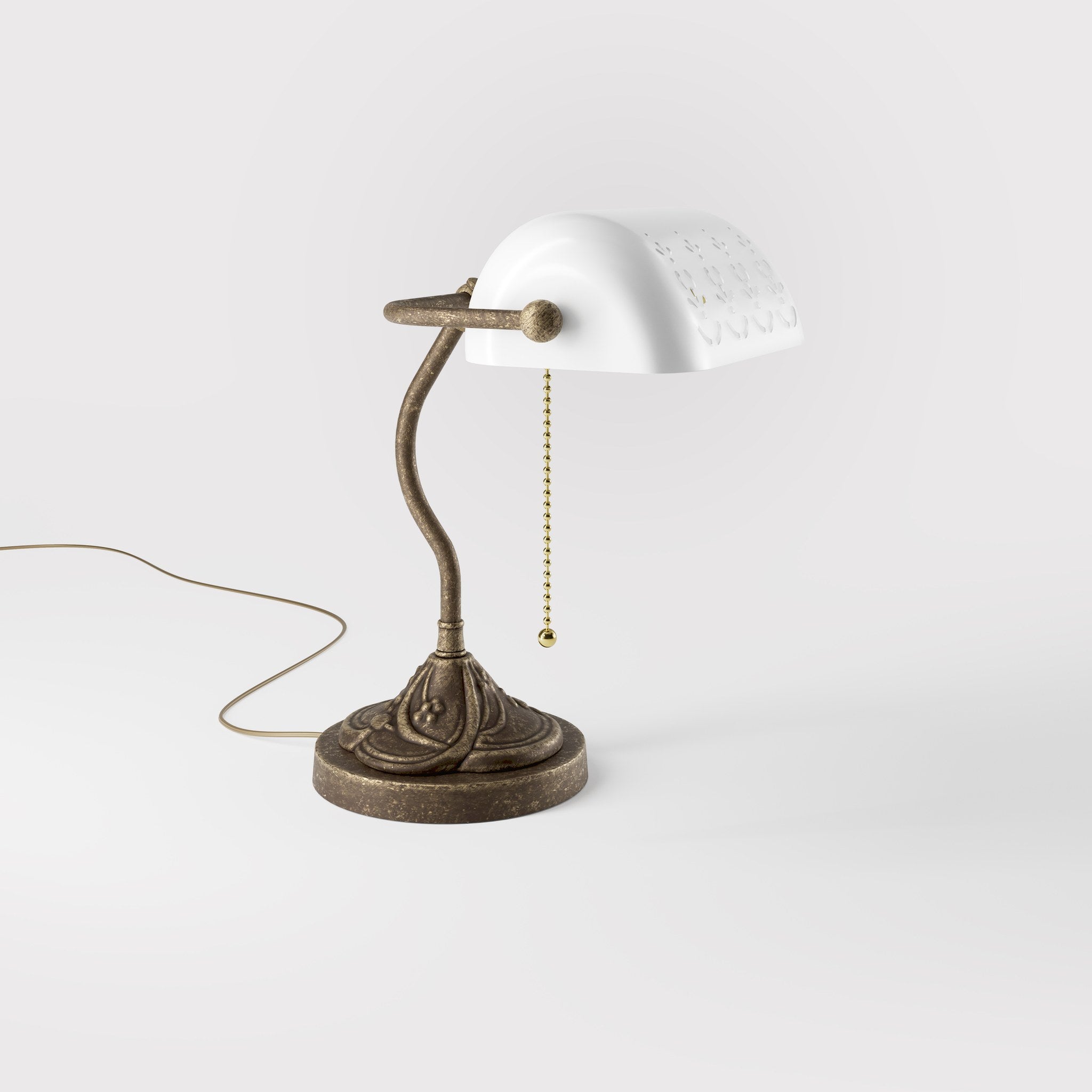Art Nouveau table lamp with pierced white ceramic shade decorated brass base with floral motifs and pull chain by Ghidini 1849 - Finish: OAS Antique Brass