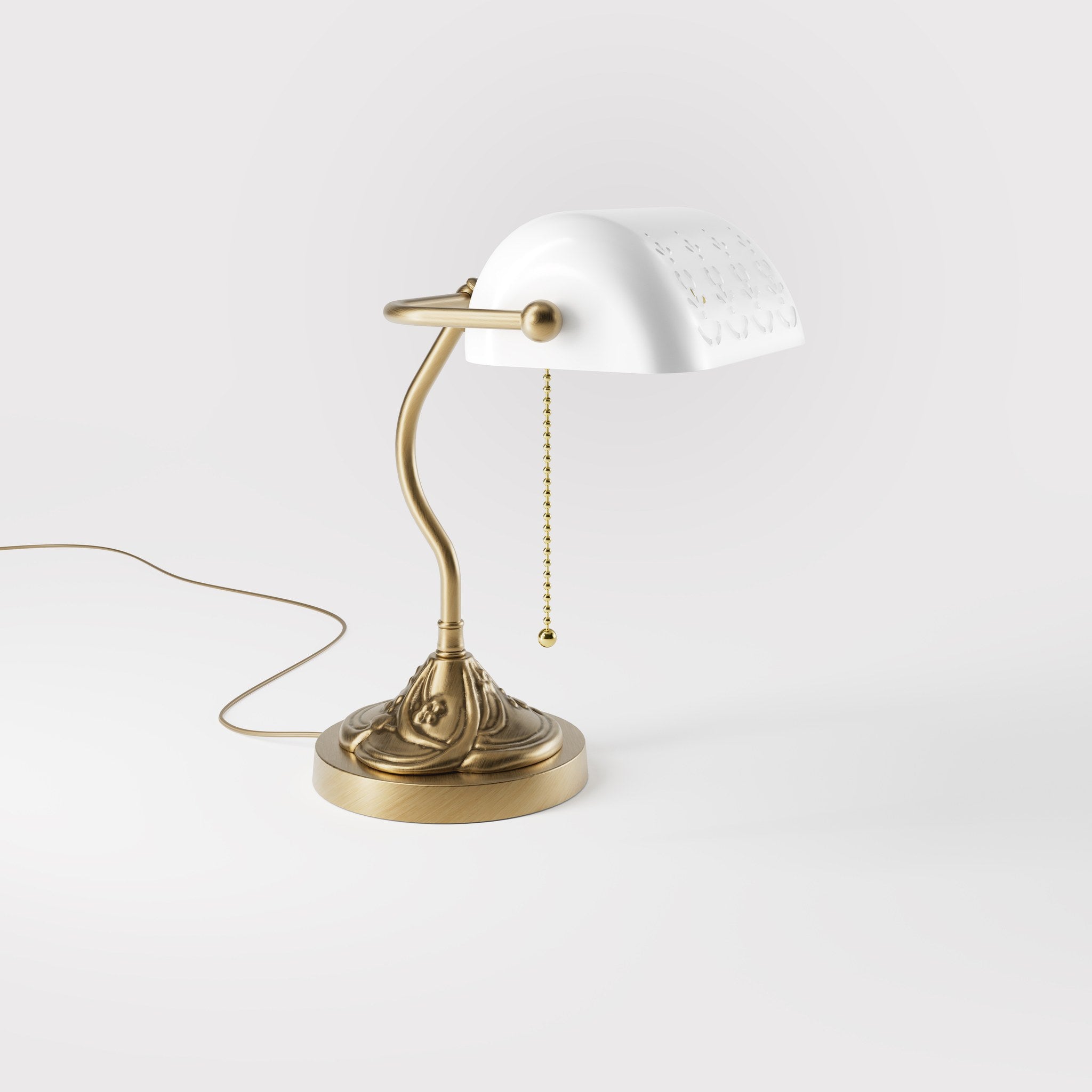 Art Nouveau table lamp with pierced white ceramic shade decorated brass base with floral motifs and pull chain by Ghidini 1849 - Finish: OBS Bronze Satin Brass