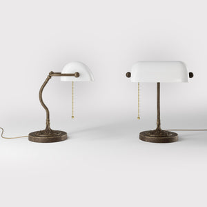 Art Nouveau table lamp with white glass shade sinuous brass stem decorated base with floral motifs and pull chain by Ghidini 1849 - Finish: OAS Antique Brass