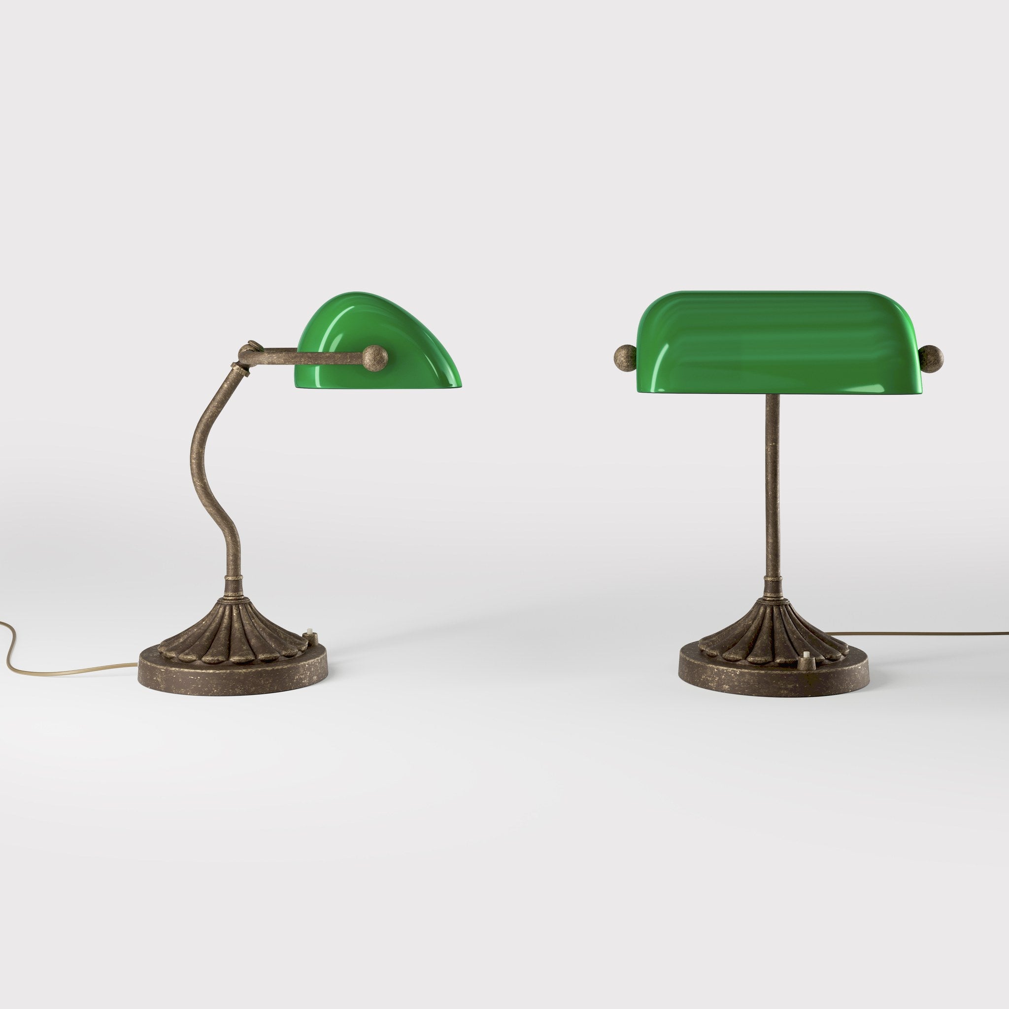 Art Deco desk lamp with green glass shade shell-shaped brass base with decorated design and sinuous stem by Ghidini 1849 - Finish: OAS Antique Brass