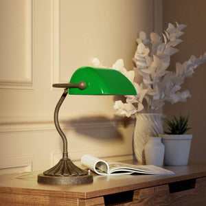 Art Deco desk lamp with green glass shade shell-shaped brass base with decorated design and sinuous stem by Ghidini 1849 - Finish: OAS Antique Brass