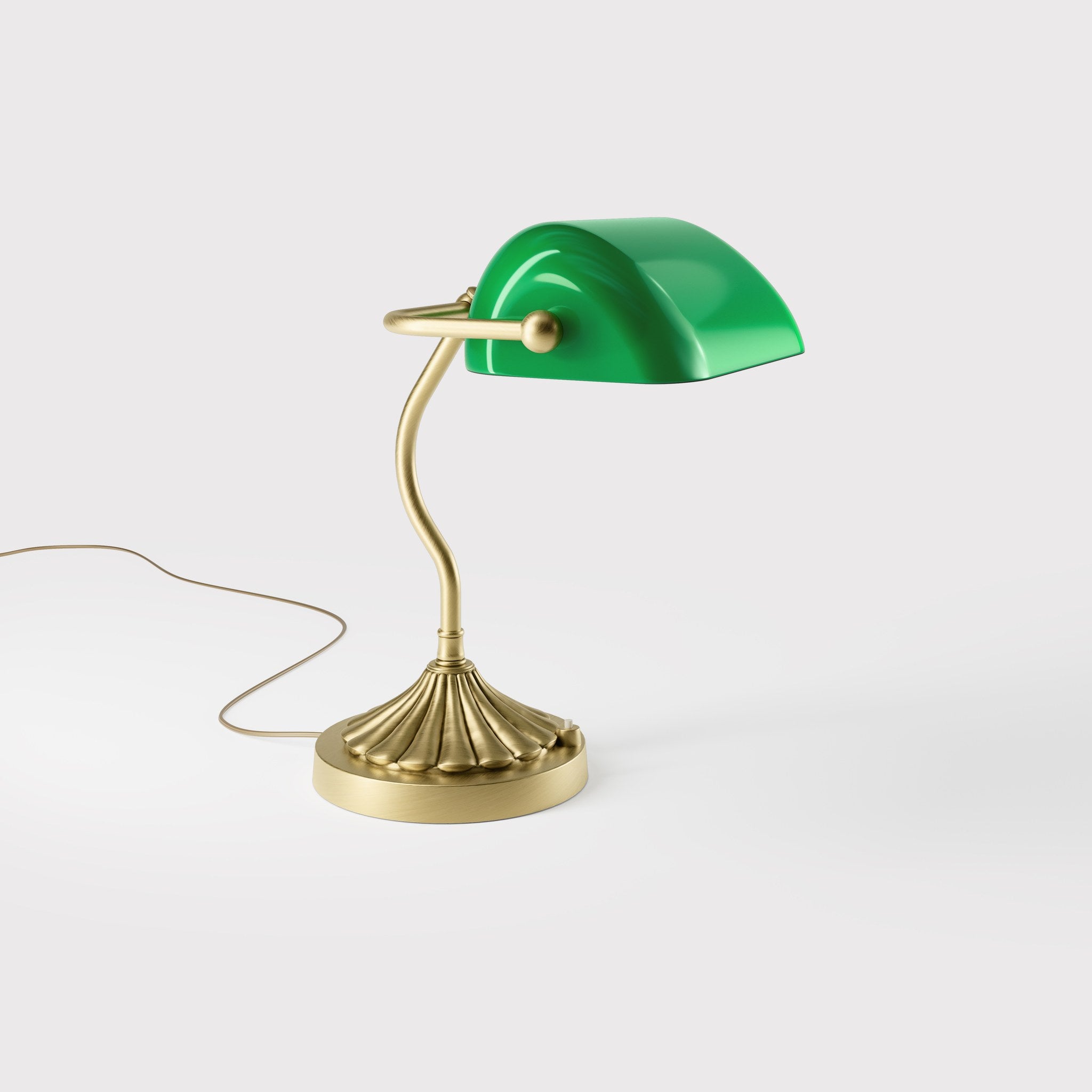 Art Deco desk lamp with green glass shade shell-shaped brass base with decorated design and sinuous stem by Ghidini 1849 - Finish: OBV Bronze Satin Light Brass