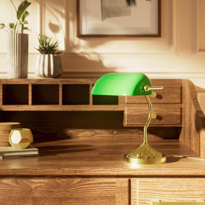 Art Deco desk lamp with green glass shade shell-shaped brass base with decorated design and sinuous stem by Ghidini 1849 - Finish: OLV Polished Brass