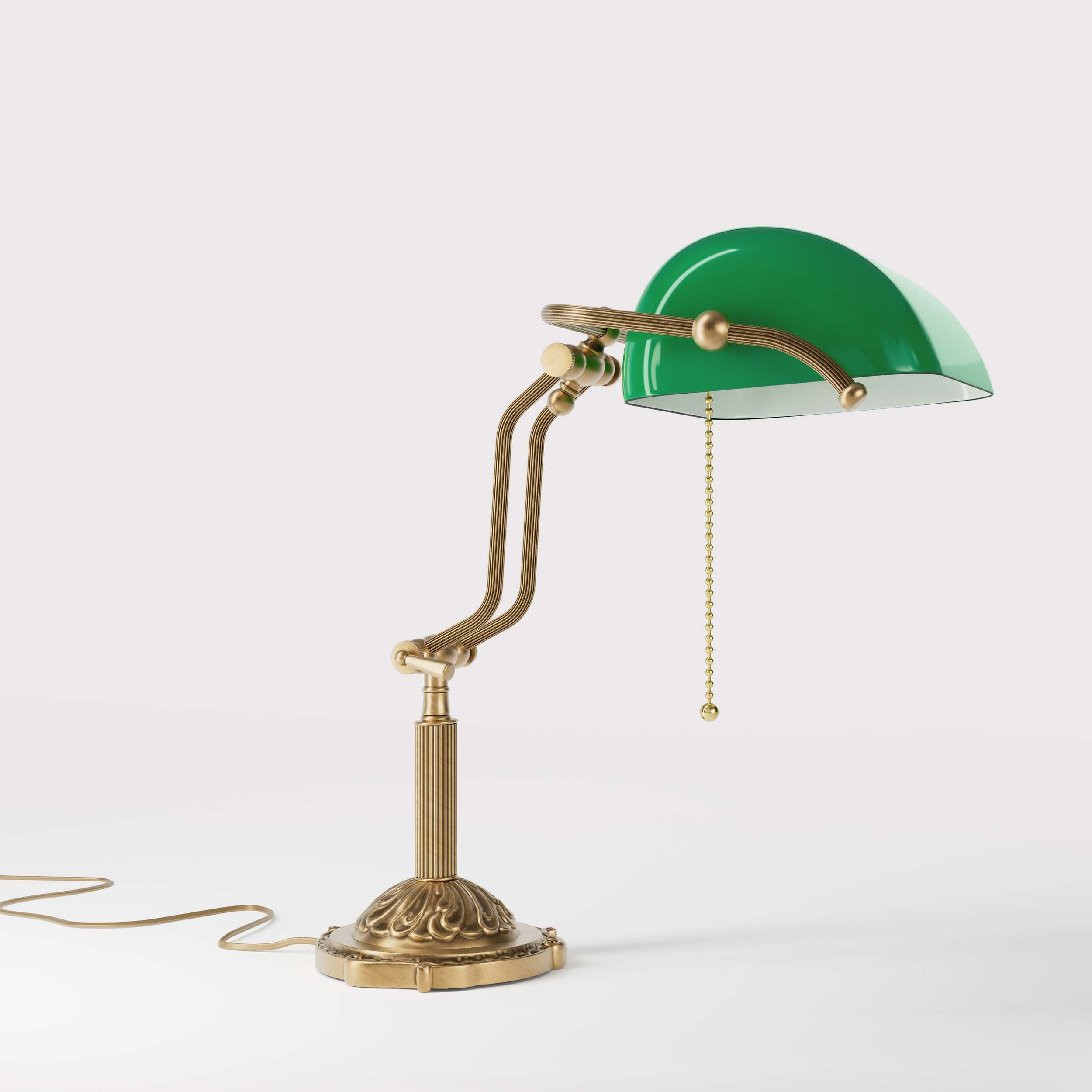 Banker's lamp with green glass shade double joint ornamental brass base with leaf motifs and pull chain by Ghidini 1849 - Finish: OBS Bronze Satin Brass