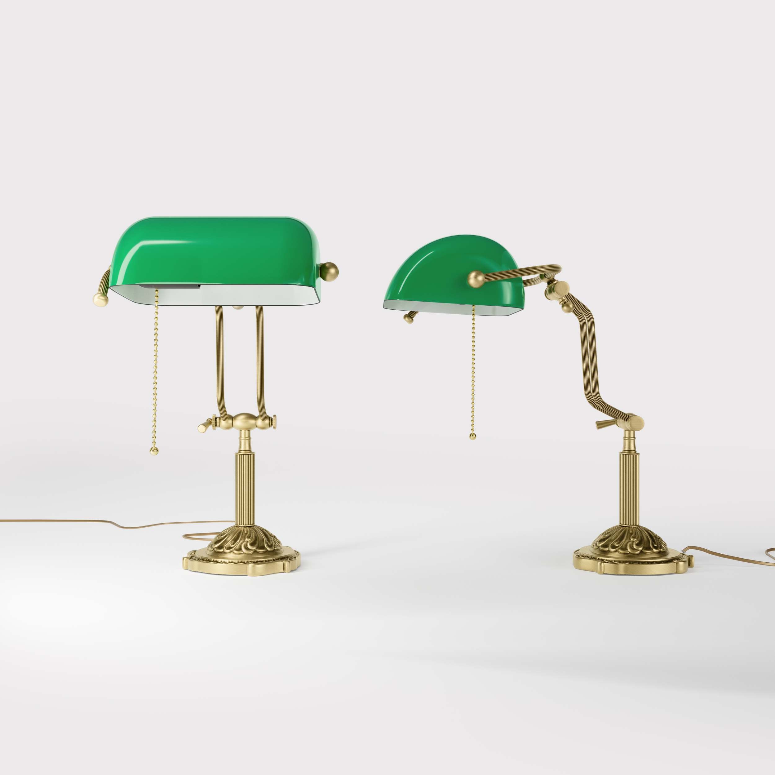 Banker's lamp with green glass shade double joint ornamental brass base with leaf motifs and pull chain by Ghidini 1849 - Finish: OBV Bronze Satin Light Brass