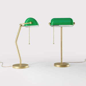 Minimalist table lamp with green glass shade circular brass base slender stem and pull chain by Ghidini 1849 - Finish: OBV Bronze Satin Light Brass