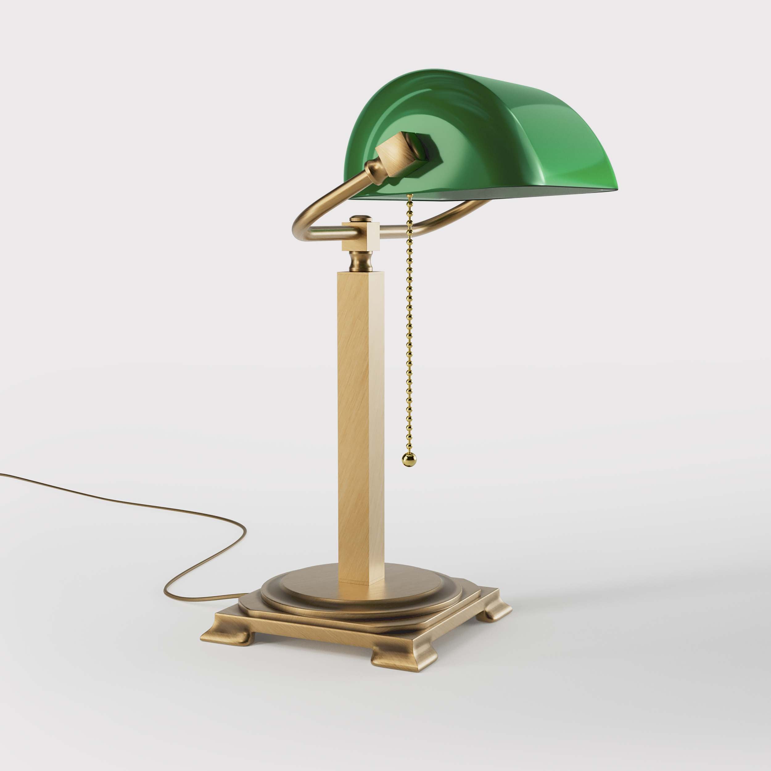 Executive library lamp with green glass shade and brass structure, decorative geometric base and golden pull chain by Ghidini 1849 - Finish: OBS Bronze Satin Brass